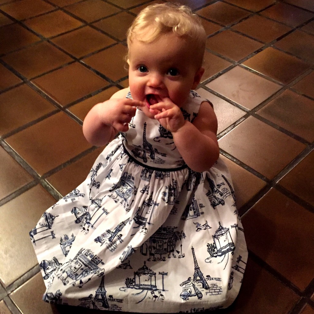 Dressed up in her Paris dress for a night on the town.  LeBeef got this for her before she was born.